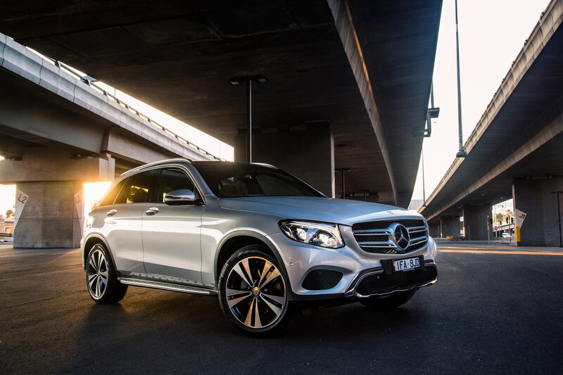 Silver Mercedes-Benz GLC under highway