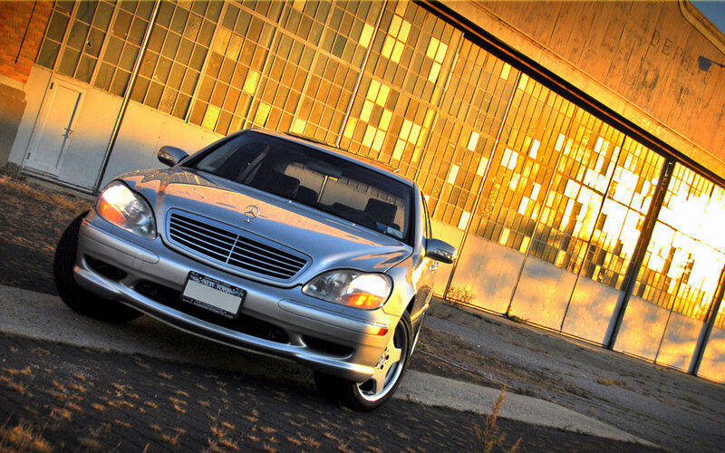 silver mercedes-benz in golden light