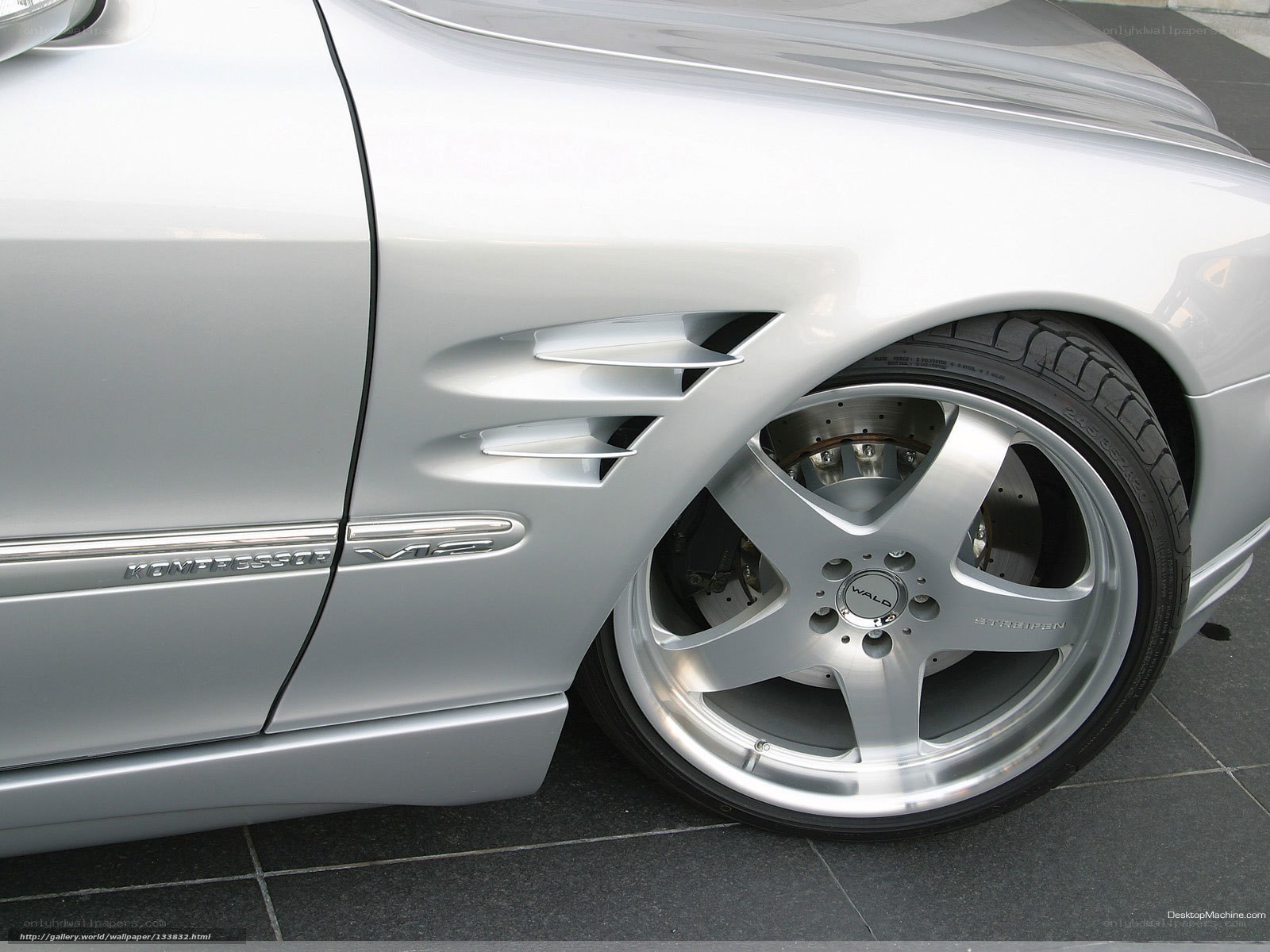 silver mercedes-benz kompressor