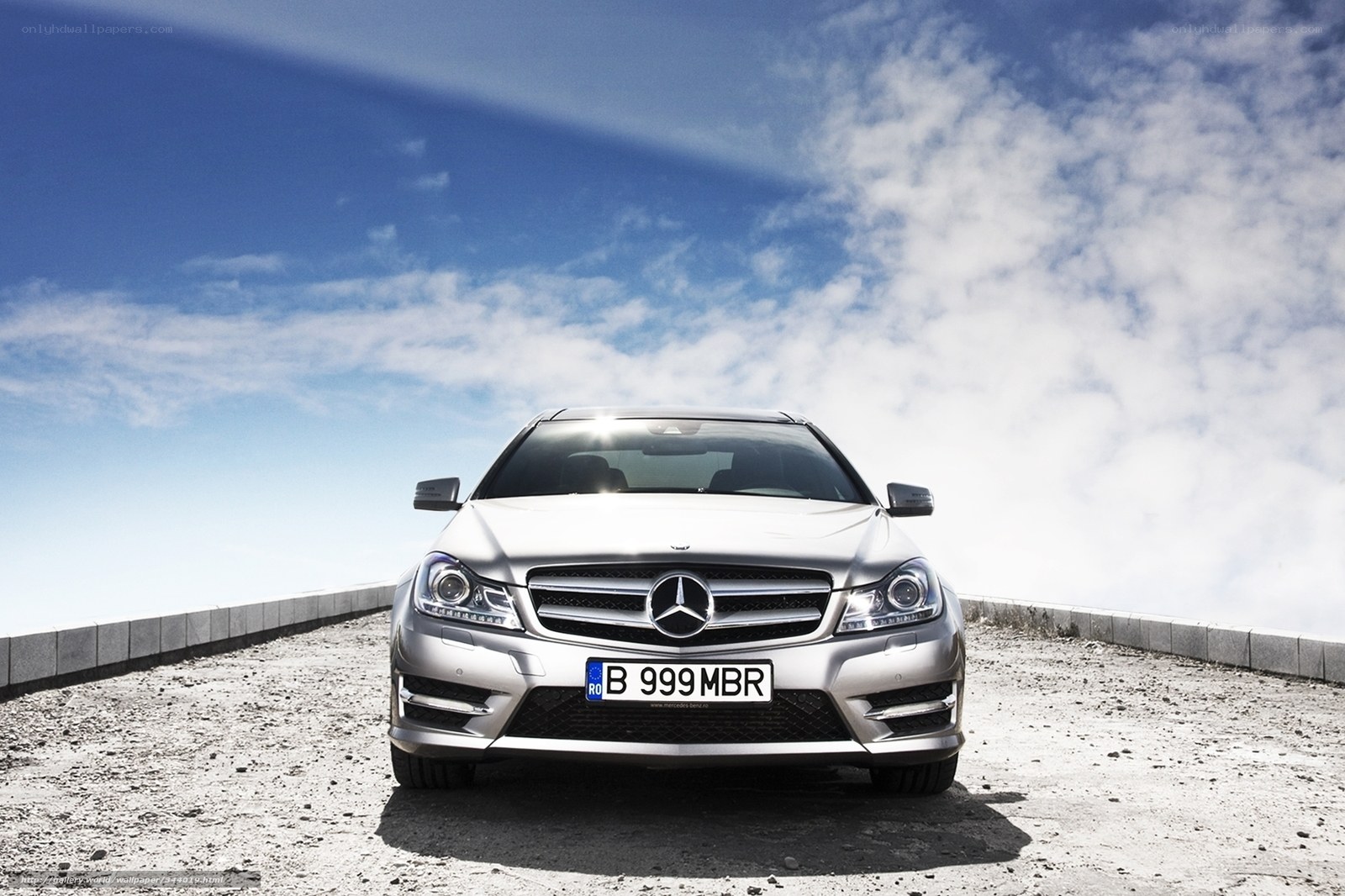 Silver Mercedes-Benz on a mountain road