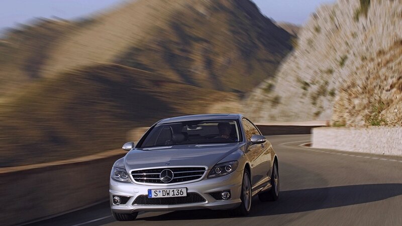 Silver Mercedes-Benz on a winding road