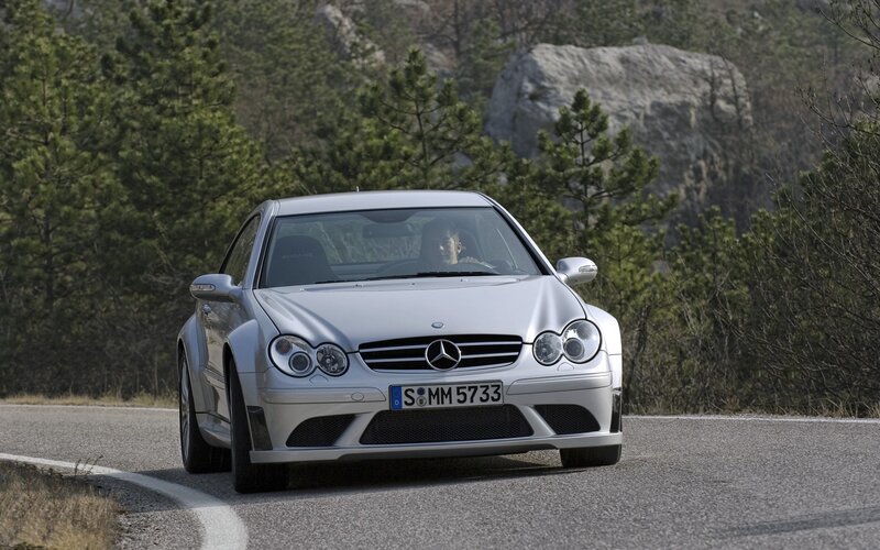 Silver Mercedes-Benz on a winding road