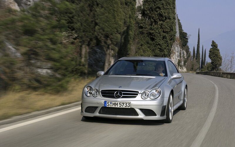 Silver Mercedes-Benz on a winding road