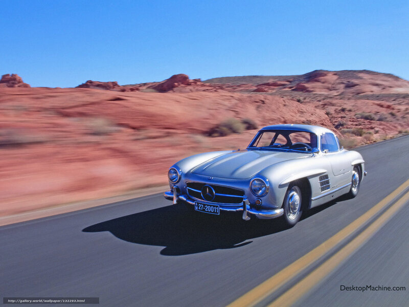 Silver Mercedes-Benz on desert road