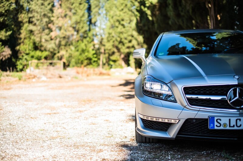 silver mercedes-benz on gravel