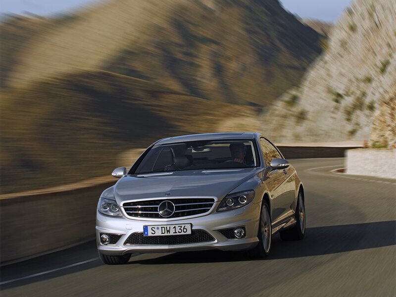 silver mercedes-benz on winding road