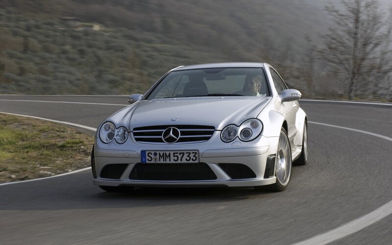 silver mercedes-benz on winding road