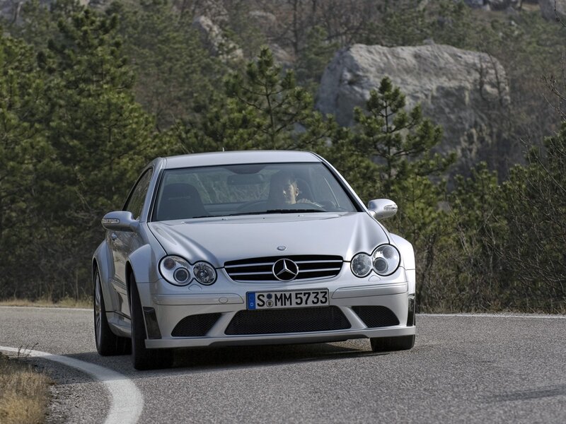 silver mercedes-benz on winding road