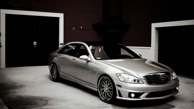 silver mercedes-benz parked in garage