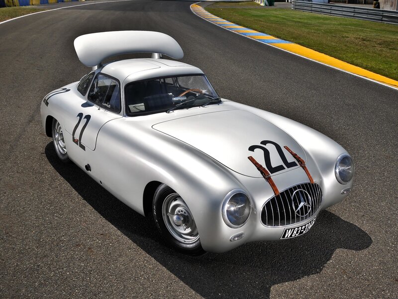 Silver Mercedes-Benz race car on track