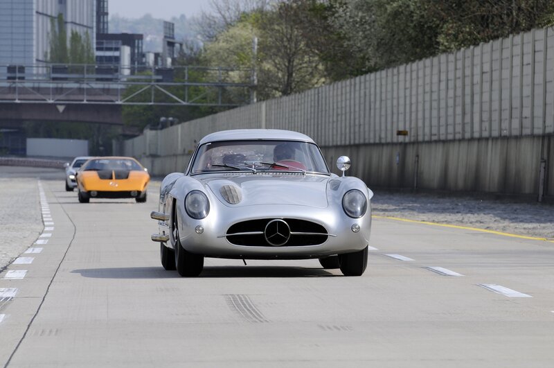 Silver Mercedes-Benz race car on track