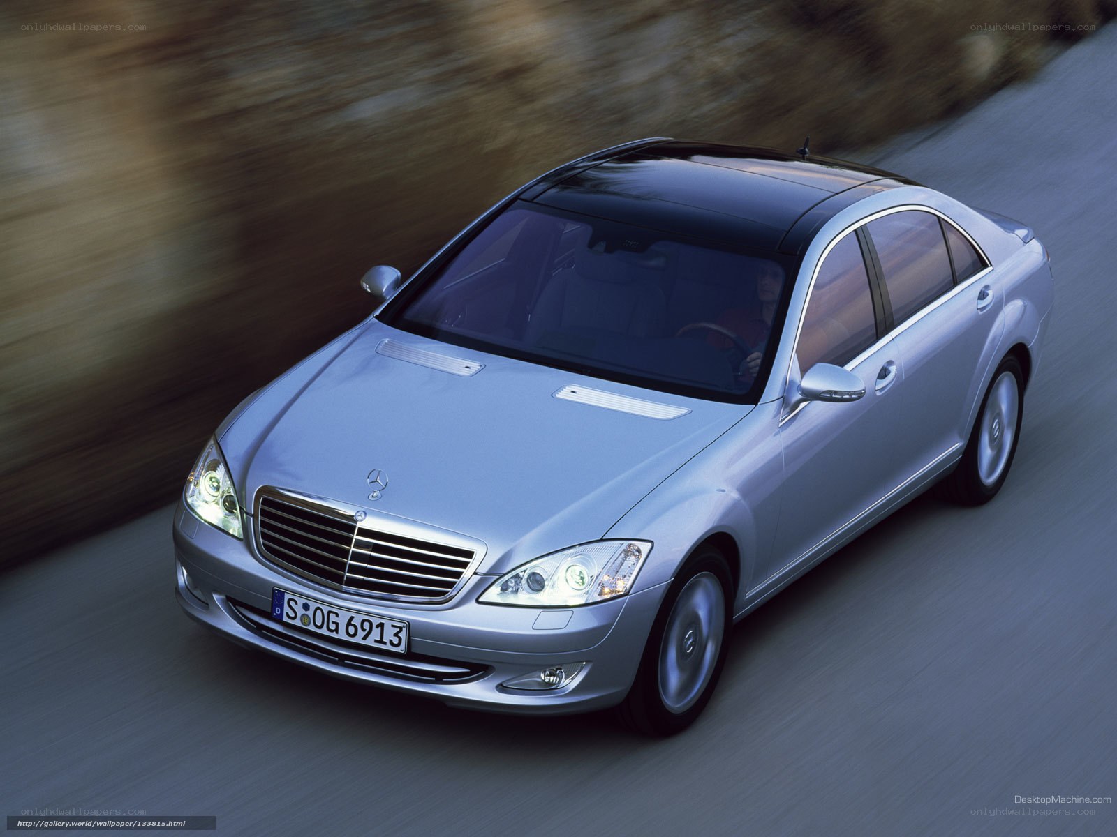 silver mercedes-benz s-class in motion