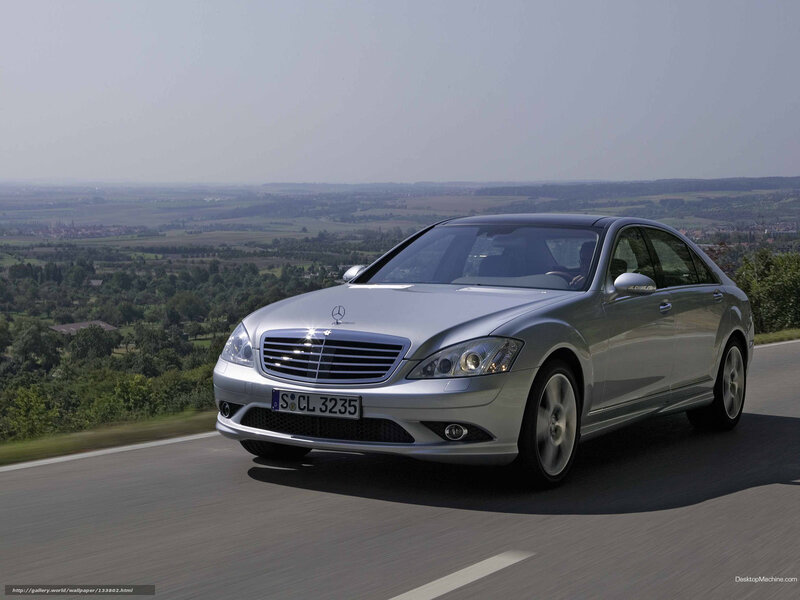 Silver Mercedes-Benz S-Class on a scenic road