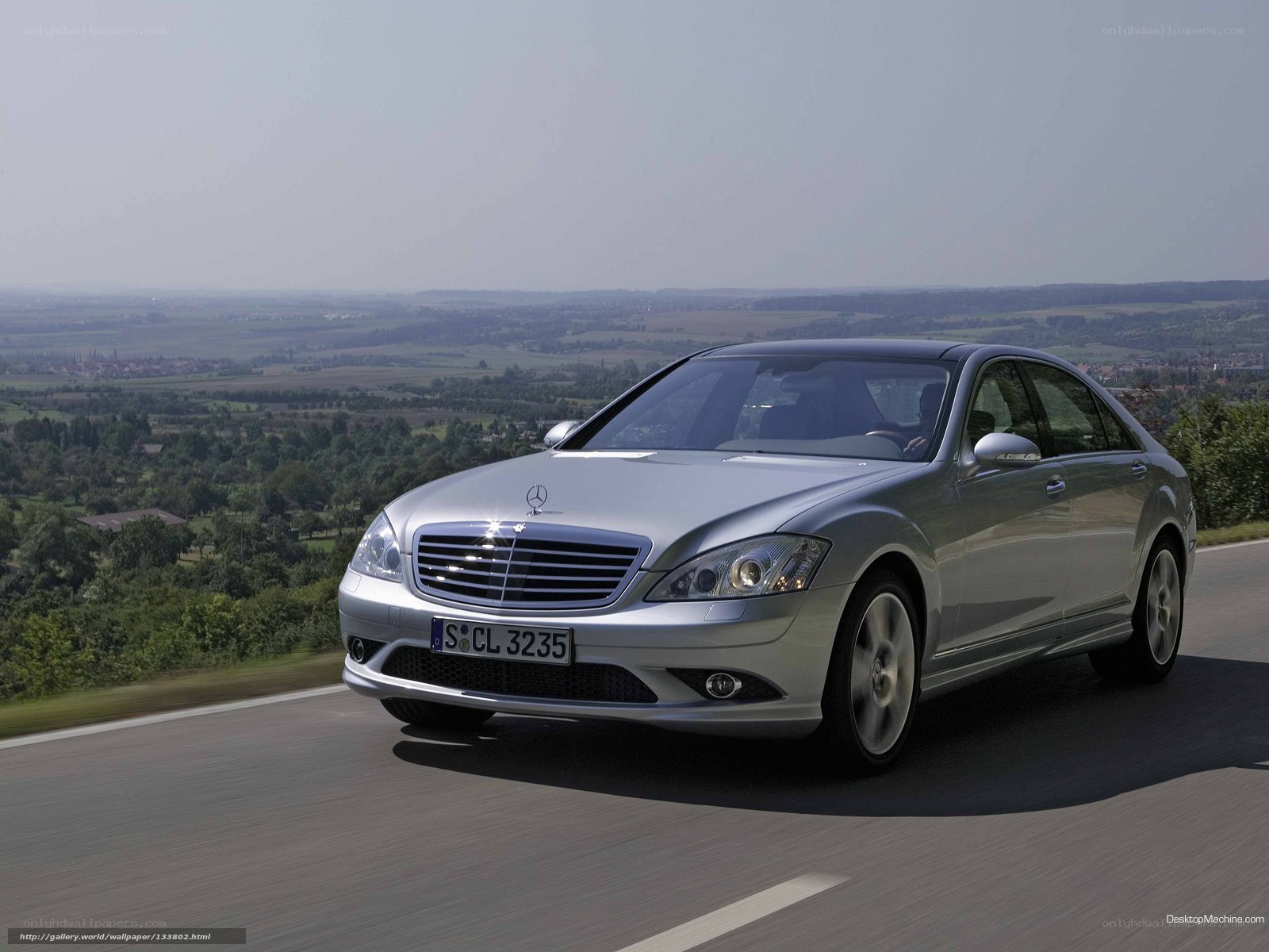 Silver Mercedes-Benz S-Class on a scenic road
