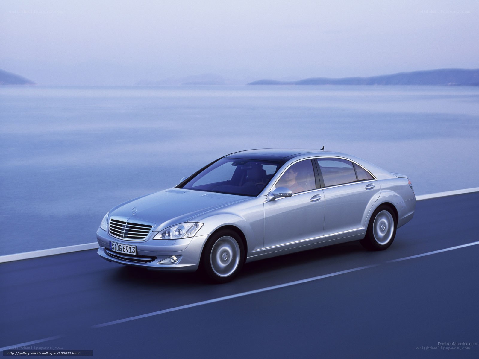 Silver Mercedes-Benz S-Class on coastal road