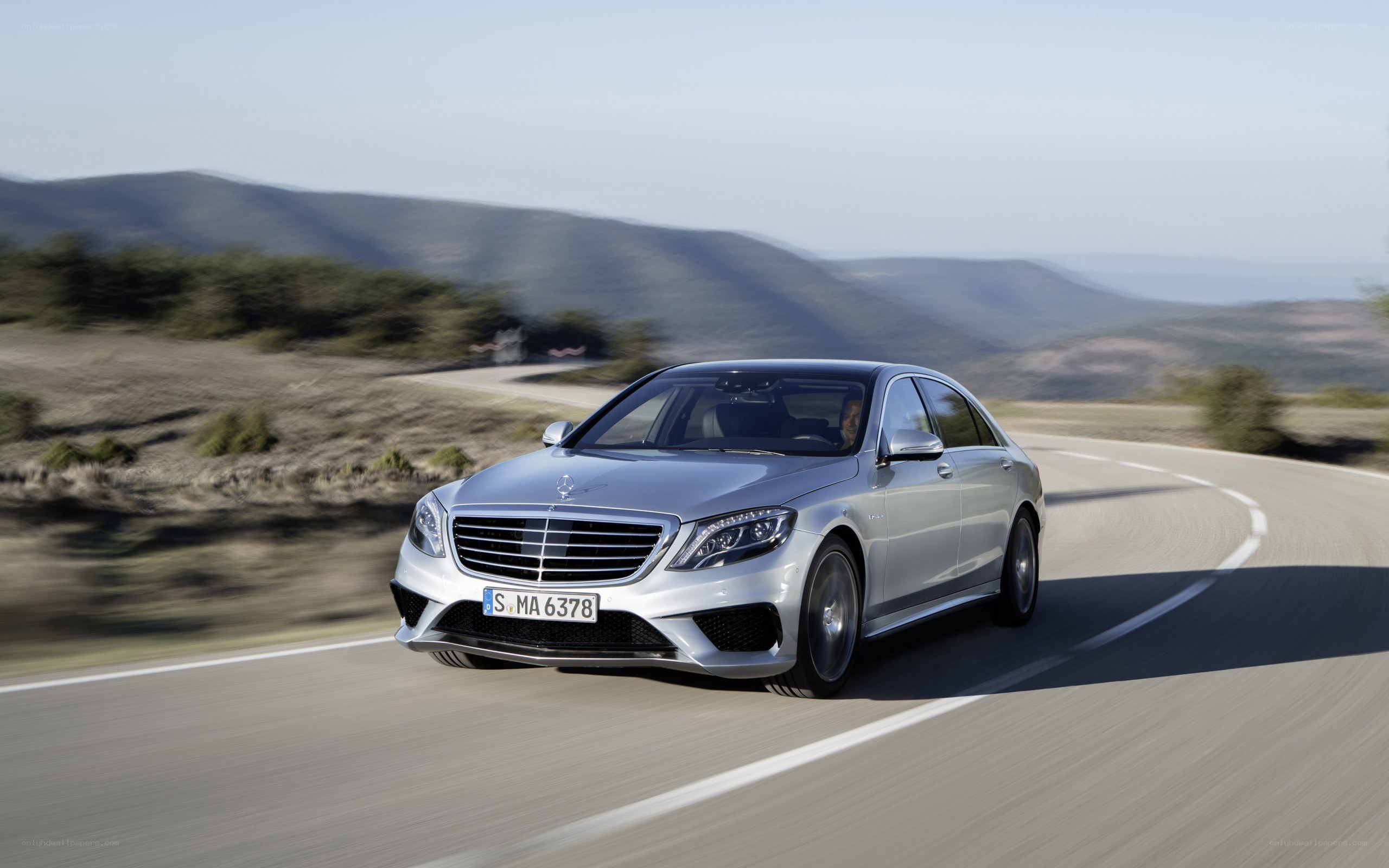 silver mercedes-benz s63 amg driving