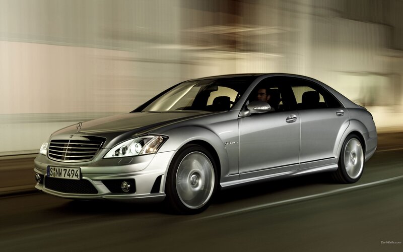silver mercedes-benz s63 amg in motion