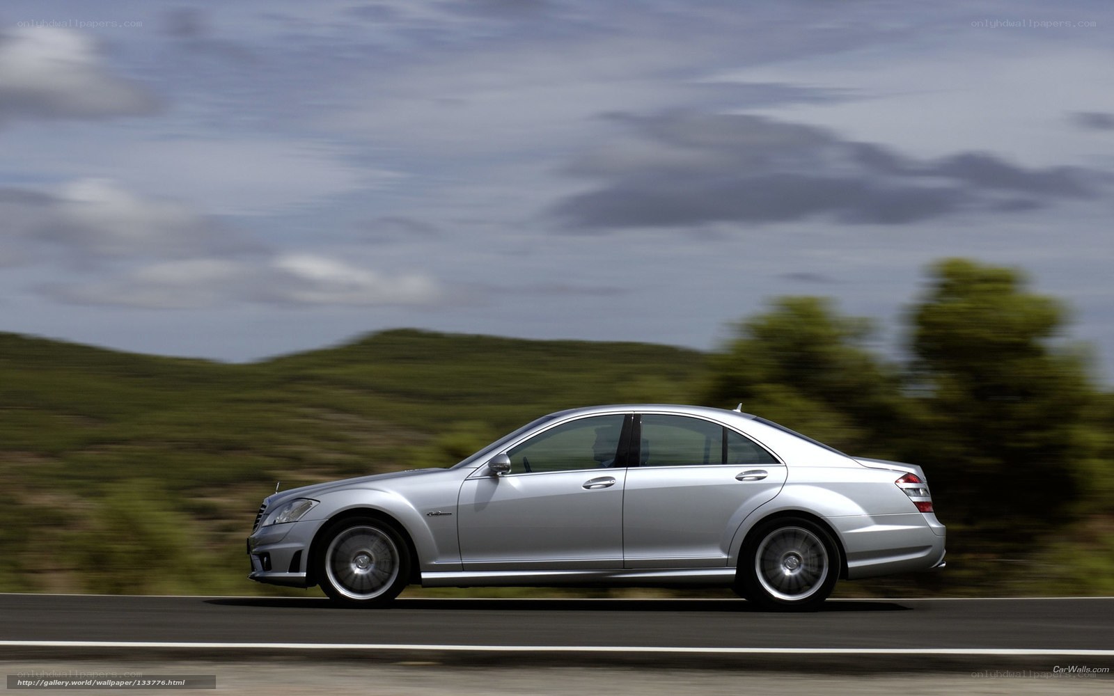 silver mercedes-benz s63 amg in motion