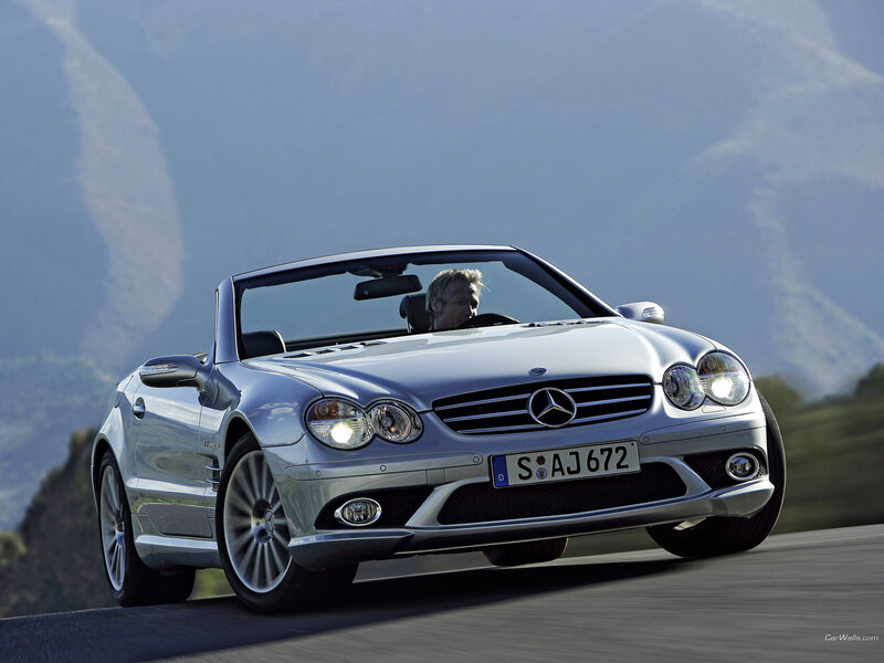 silver mercedes-benz sl500 driving