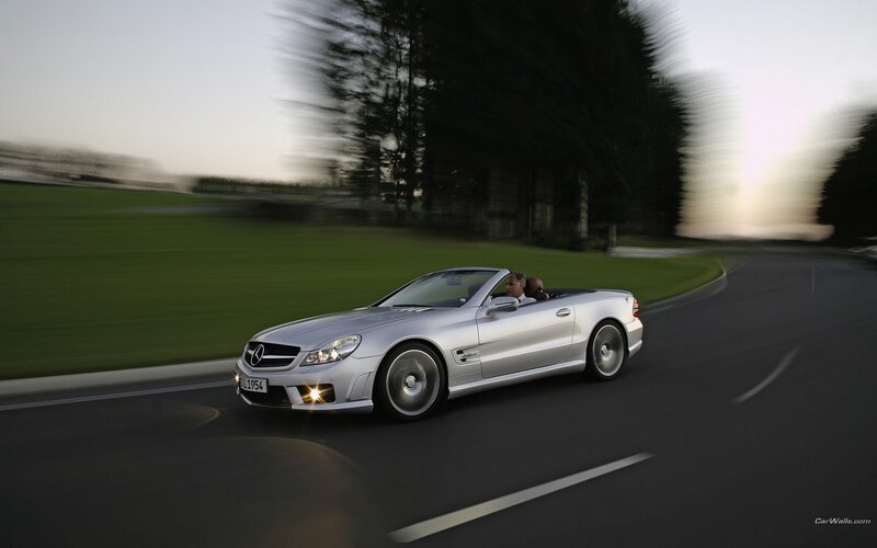 silver mercedes-benz sl55 amg driving