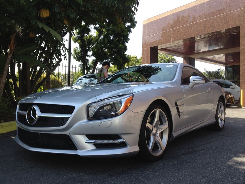 Silver Mercedes-Benz SL550 parked