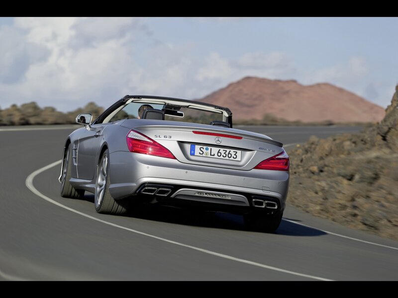 Silver Mercedes-Benz SL63 AMG driving