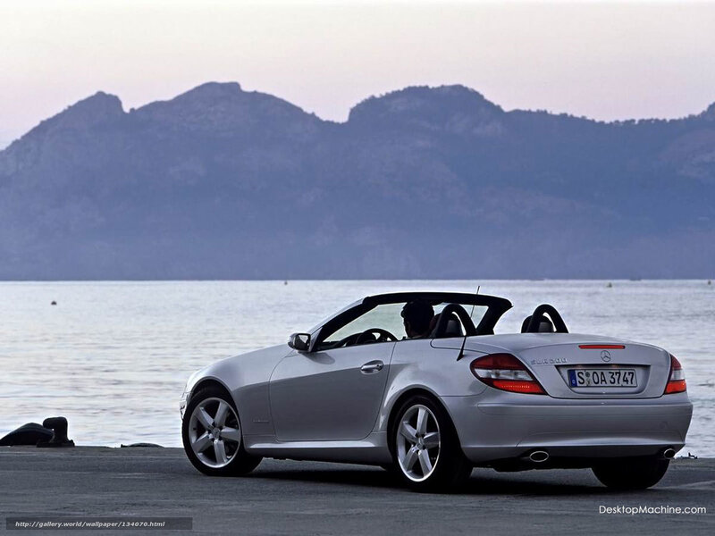 Silver Mercedes-Benz SLK by the sea