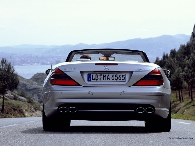 Silver Mercedes-Benz SLK driving