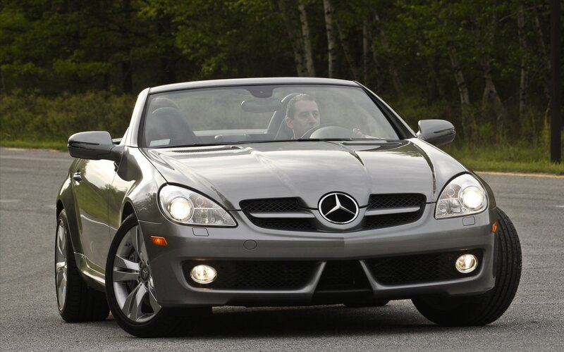 Silver Mercedes-Benz SLK driving