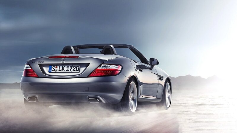 Silver Mercedes-Benz SLK driving