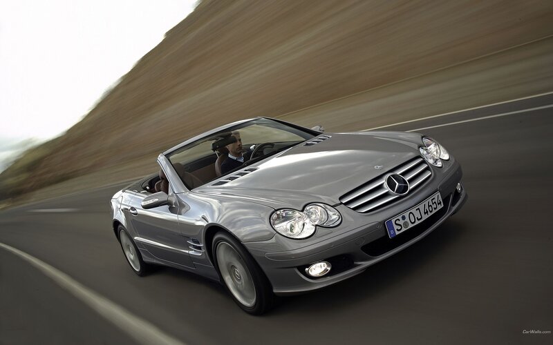 Silver Mercedes-Benz SLK driving