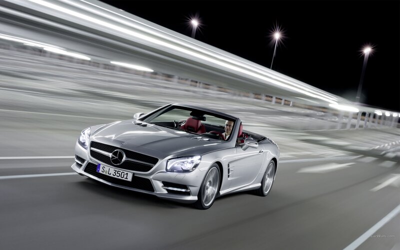 Silver Mercedes-Benz SLK driving at night