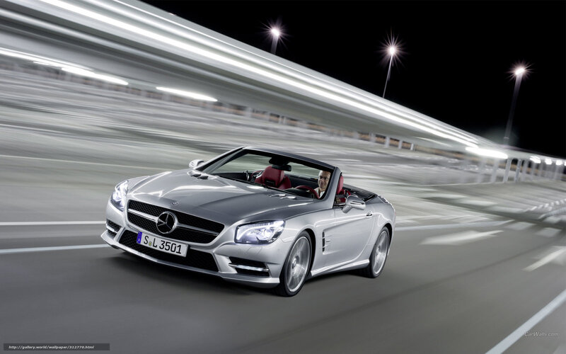 Silver Mercedes-Benz SLK driving at night