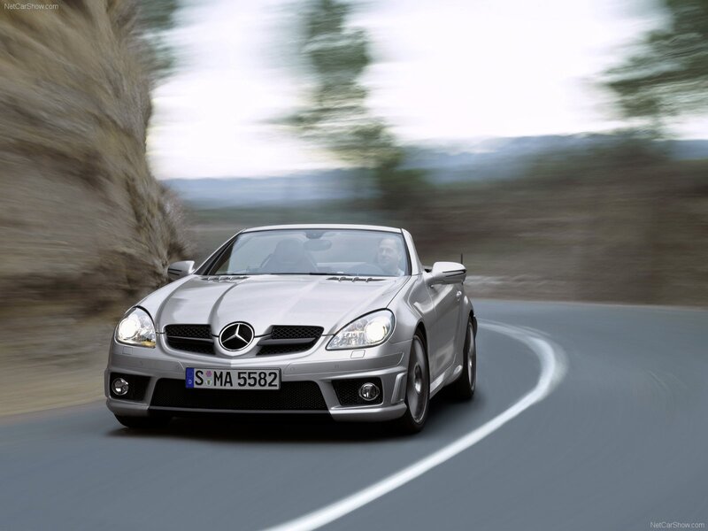Silver Mercedes-Benz SLK driving on road