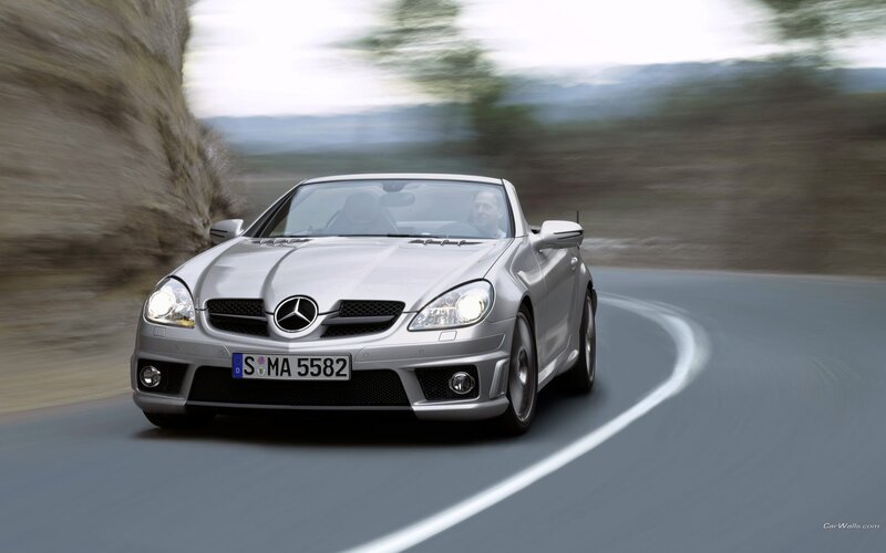 Silver Mercedes-Benz SLK driving on road