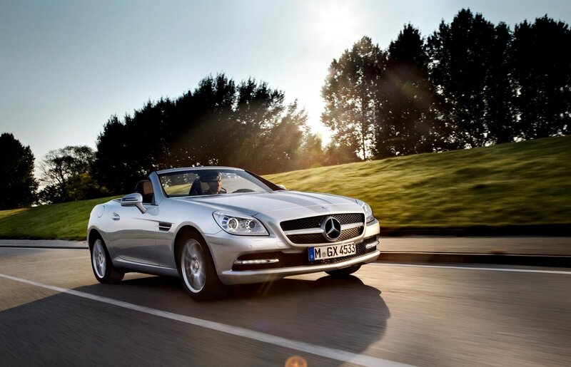 Silver Mercedes-Benz SLK driving on road