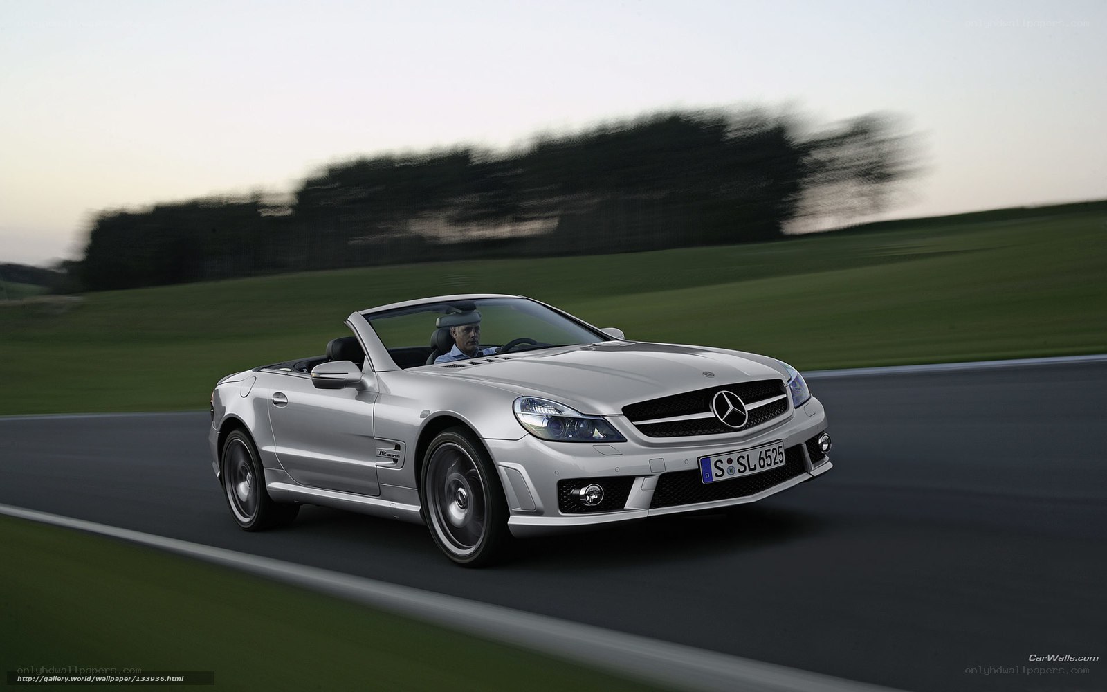 Silver Mercedes-Benz SLK driving