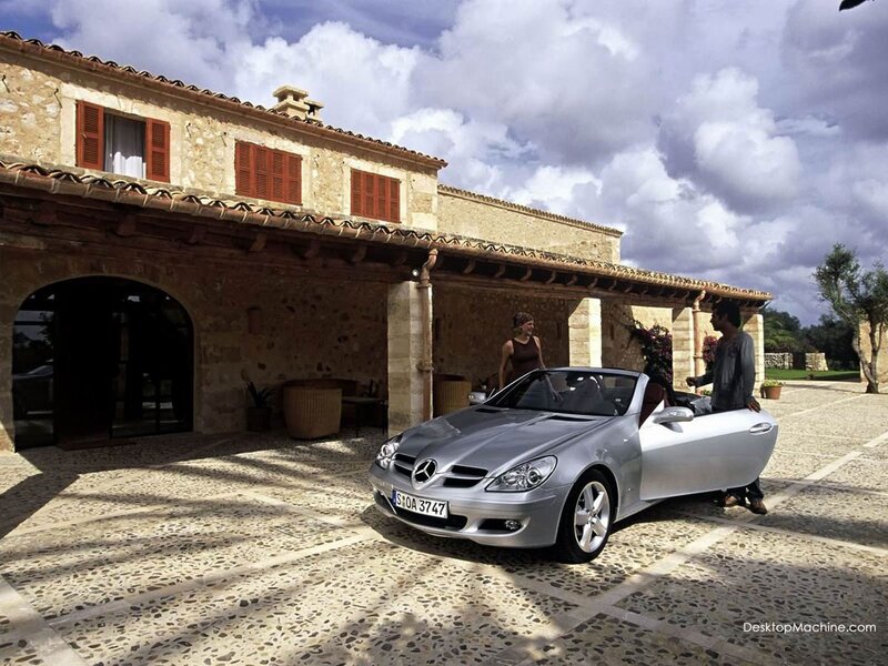 Silver Mercedes-Benz SLK in courtyard
