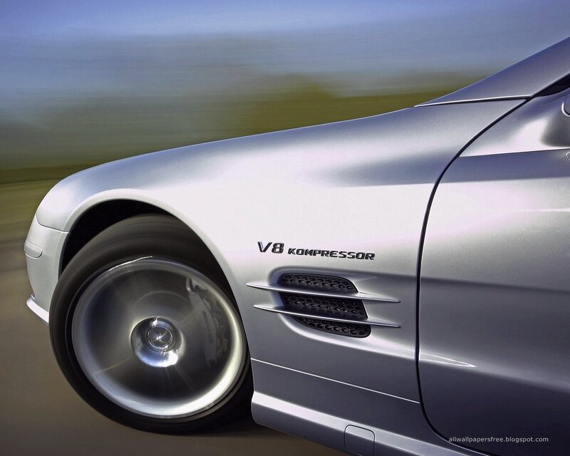 silver mercedes-benz slk in motion
