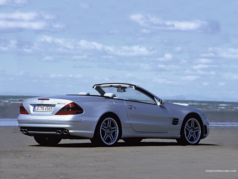 Silver Mercedes-Benz SLK on beach