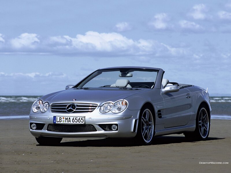 Silver Mercedes-Benz SLK on beach