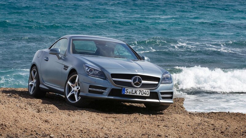 Silver Mercedes-Benz SLK on beach