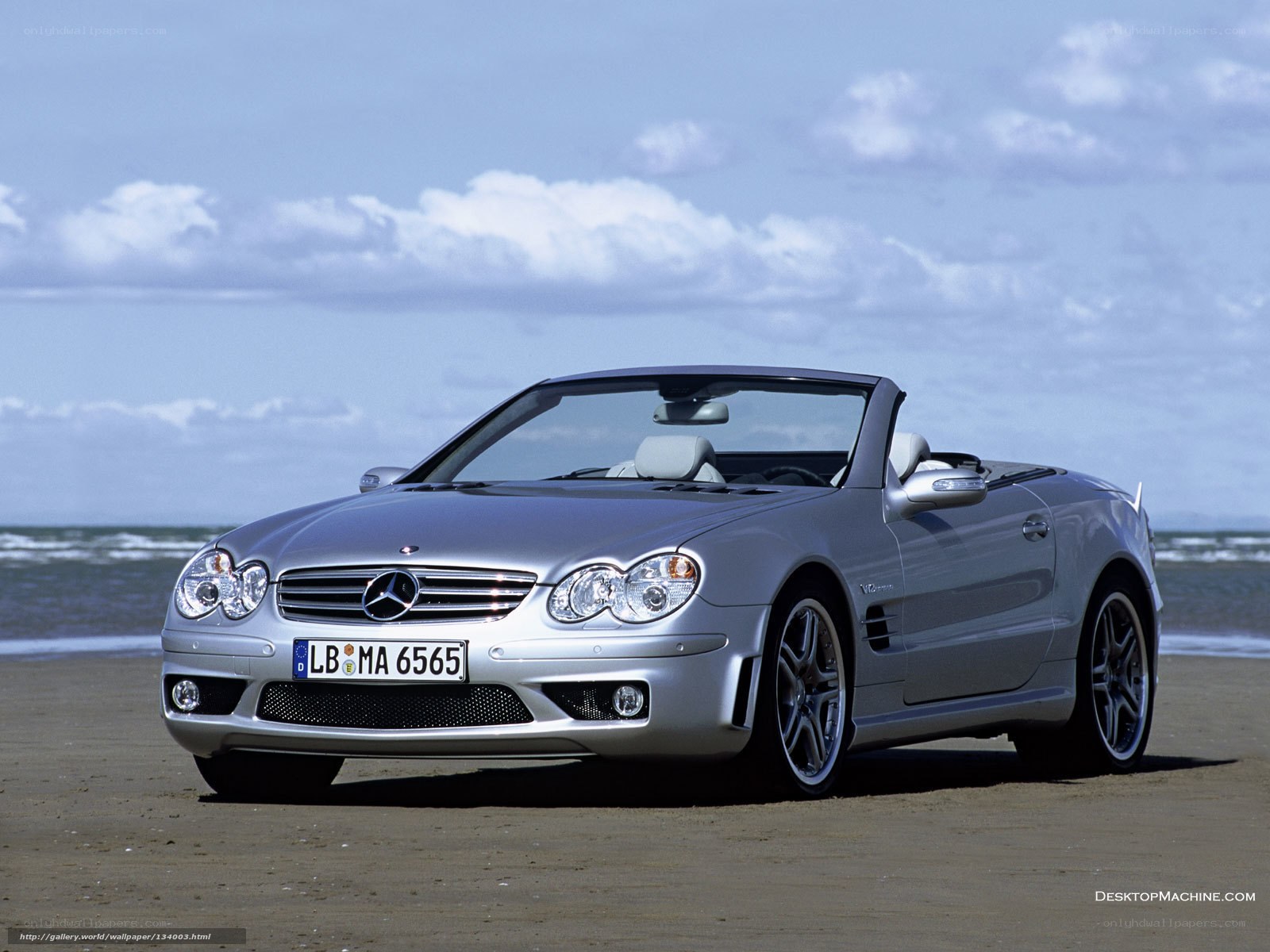 Silver Mercedes-Benz SLK on beach