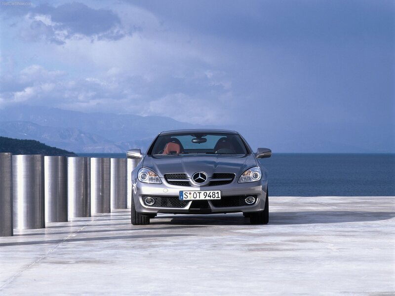 Silver Mercedes-Benz SLK parked by the sea