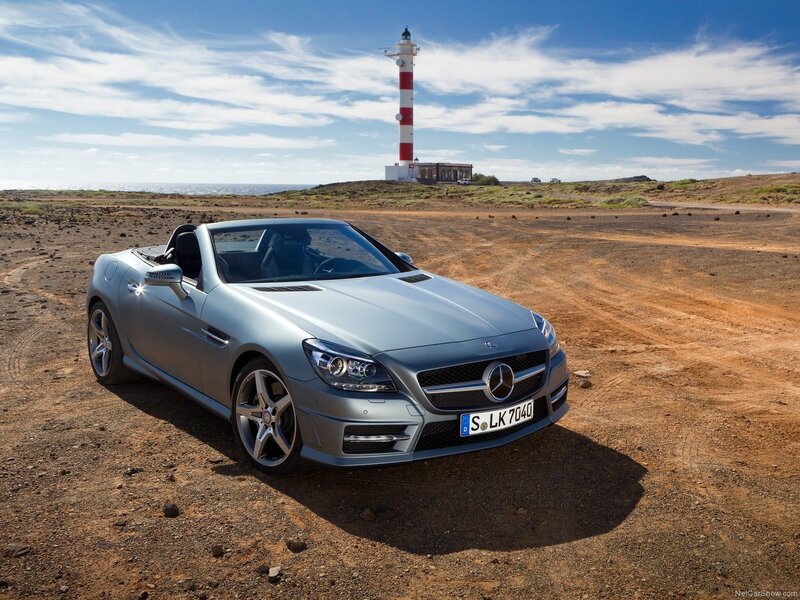 Silver Mercedes-Benz SLK parked near lighthouse