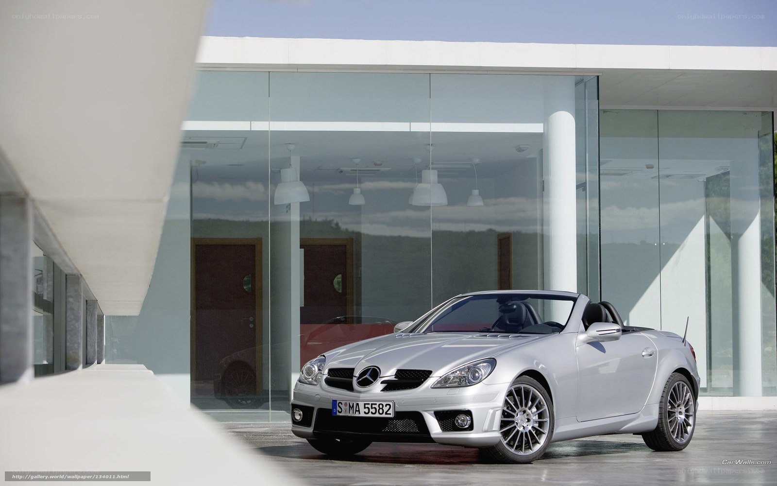 Silver Mercedes-Benz SLK parked outside