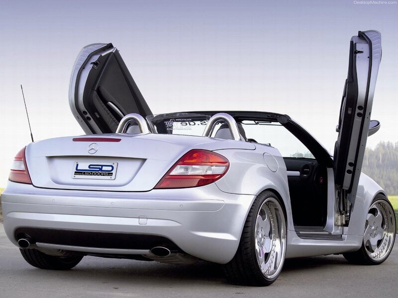 silver mercedes-benz slk with gullwing doors