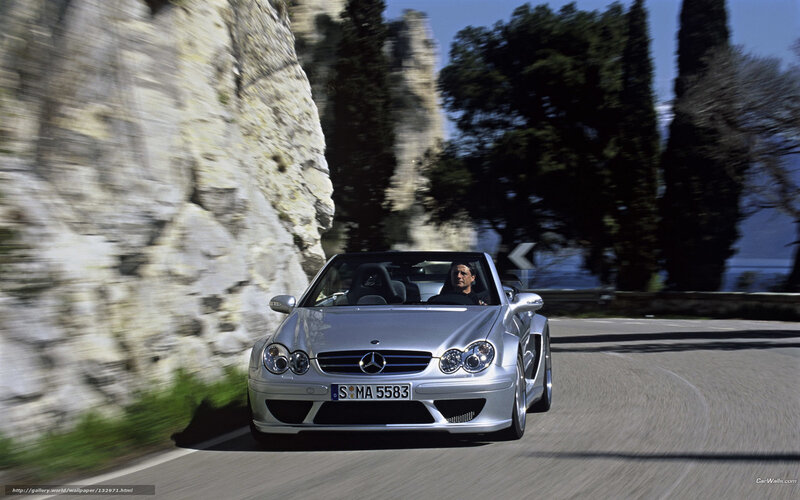 Silver Mercedes-Benz SLR on a coastal road