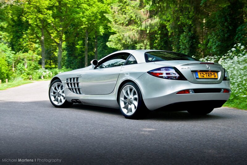 Silver Mercedes-Benz SLR on a forest road