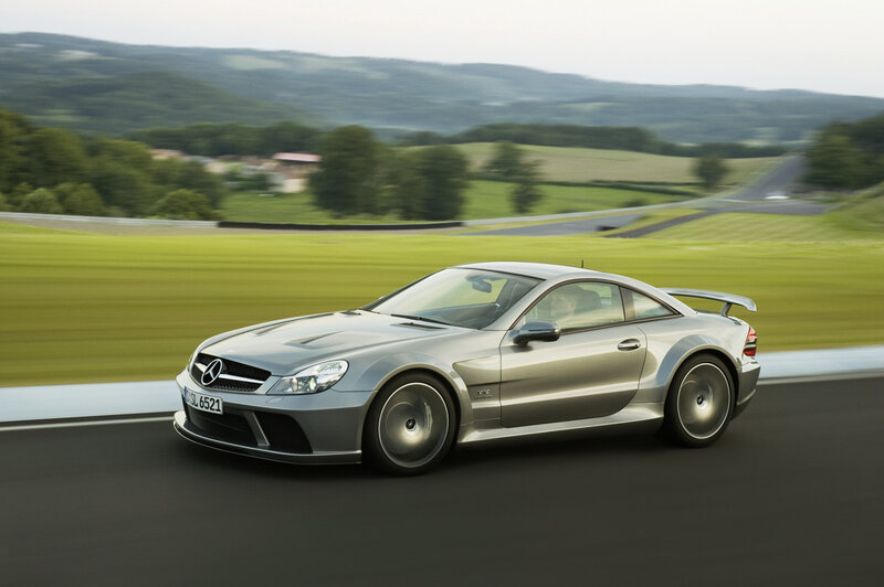silver mercedes-benz slr on track